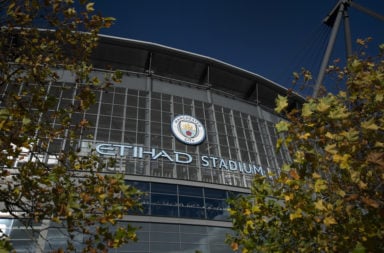 Etihad Stadium logo with the Manchester City club crest